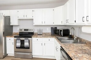Cook in comfort in our modern kitchen, fully equipped with everything you need for culinary creativity.