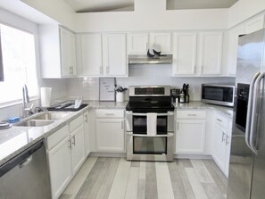 Fully equipped kitchen stocked with all of the amenities