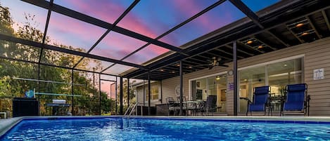 Private screened in heated pool with smart speakers and smart lighting.