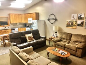 Living room, 3 couches around TV