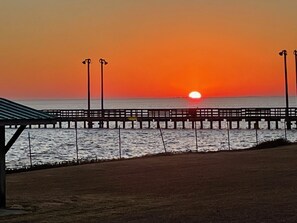 Sunset over San Antonio bay. Public lighted fishing pier a few steps from rental