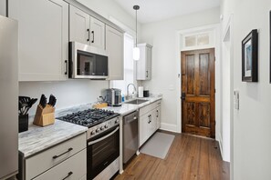 Full Kitchen Facing Hallway Door