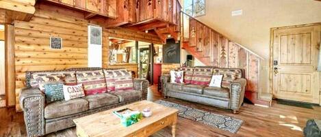 Enjoying the high wooden ceilings of the cozy living room. 