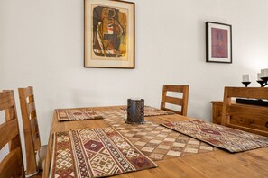 The dining table seats 6 guests