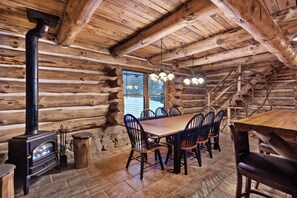 Dining Area - Main Level - with fireplace, complete with table and chairs for 8.