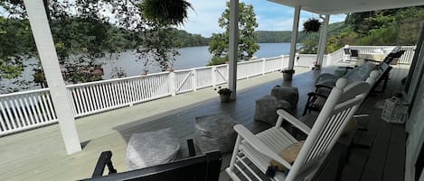 Huge front porch with ample seating to take in the beautiful scenery of the Lake