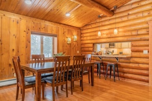 Dining Room Table in an Open Floor Plan That Seats 6