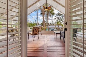 This private porch off the master bedroom upstairs provides a cozy spot for an evening glass of wine or morning coffee.