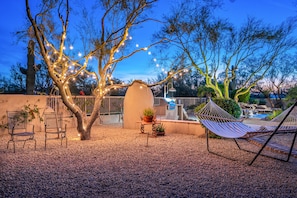 Relax on the casita under twinkling lights.