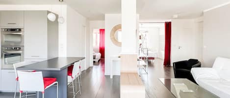 Découvrez notre espace salle à manger ouvert sur la cuisine, parfait pour des moments conviviaux.