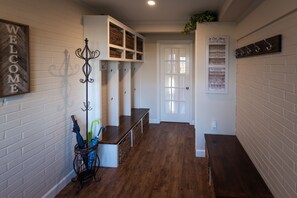 After unlocking the outside door, you will enter a shared entryway. 