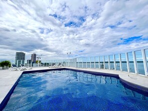 The rooftop pool, complete with sun loungers