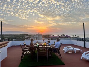 Sunset dinner on the roof top patio