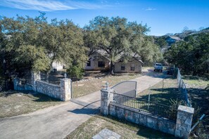 Large fenced-in yard great for kids and dogs to run. Parking for cars and boats.