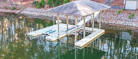 Boat dock with deep water perfect for swimming and accessing the lake.