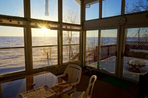 Looking out across the lake from the sunroom in winter time.