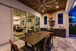 Lanai, Fireplace, Outdoor Living, Pool, TV, Sonos Sound System.