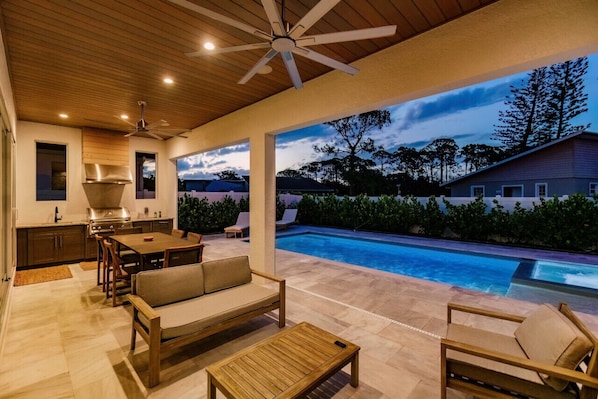Lanai, Fireplace, Outdoor and Indoor Living, Motorized Screens.