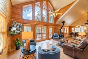 The chalet windows provide beautiful views and lots of light, making the room feel large and airy.