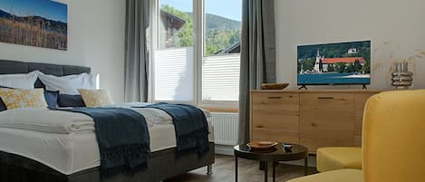 Ferienwohnung Alpenzauber - Wohn- und Schlafbereich