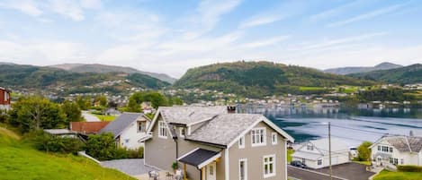 A luxury home nestled in the mountains with stunning views over Hardangerfjord