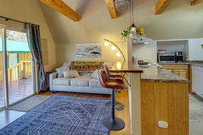 Living Room | Sleeper Sofa | Smart TV | Window A/C Unit | Pack 'n Play