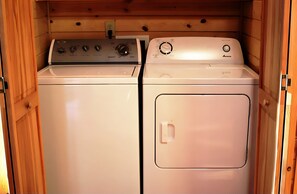 Washer and dryer on main floor available for free use along w/ 3 washer pods.