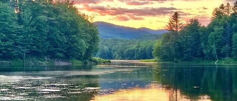 June view of Waterbury Reservoir from Right of Way behind the property. 5 minute walk from the house down a scenic trail. 