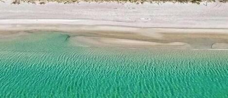 Drone footage looking at our Turtle Spa House from the Gulf.