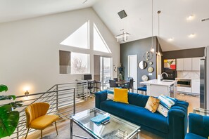 Spacious Living Room with large 70" Samsung Smart TV and seating for 6