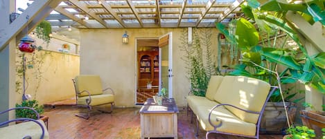 View of the back of the casita, the brick was replaced by stone and turf