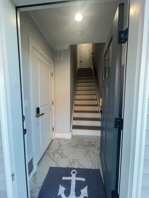 Front door to main level and garage