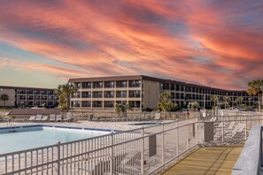 Breathtaking skies as the sun sets at the largest swimming pool on Hilton Head Island.