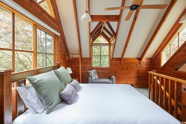 Spacious bedroom with spectacular views and ceilings.