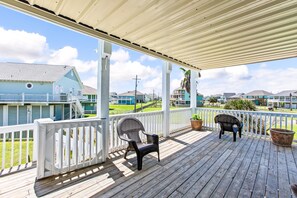 Embrace island vibes on the spacious porch with stunning views and relaxation!