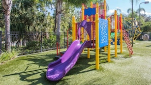 The kids will love the outdoor play area. 