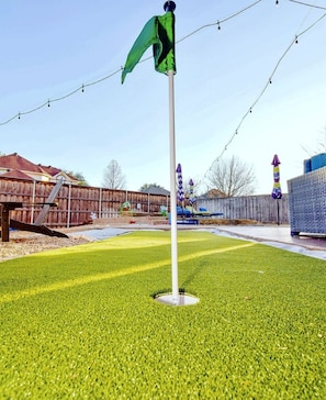 Practice your hole in one with our putting green