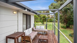 Wrap around balcony deck with seating 