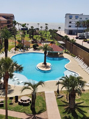 Newly updated amazing grand pool with tanning ledges!