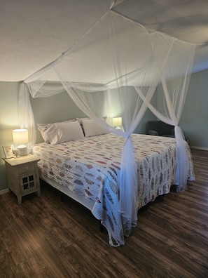 King-sized bed, located upstairs