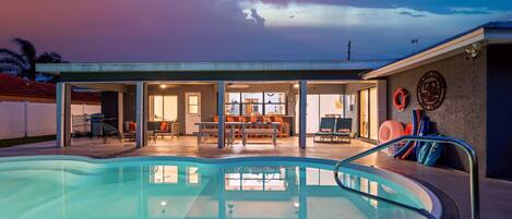The pool and patio are lit for evening enjoyment -just take it inside after 10pm