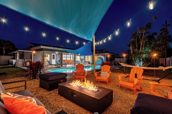 Lounge in the hammock, gather around the fire pit - enjoy the relaxing ambiance.