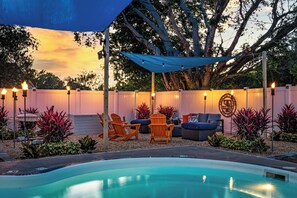 Your backyard oasis awaits - fire pit, hammock + Adirondack chairs - just relax