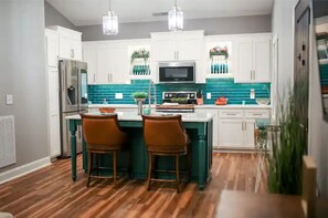 Custom kitchen with marble countertops