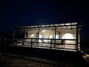 Back porch lit up at night 