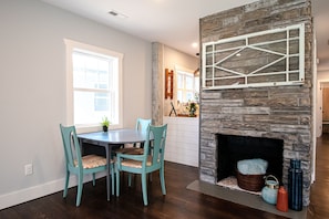 Dining Area, table is a drop leaf which has an extra leaf in the bedroom closet