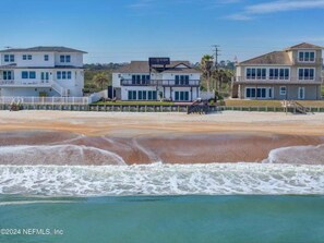 Back of the home ocean facing view on water