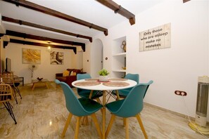 Dining area off the lounge with space for four guests