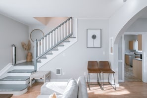 living room / stairway to top floor