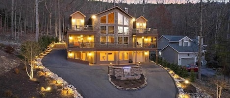 This exquisitely designed home embodies the essence of a "Luxurious Mountain Lodge." Situated within Massanutten Resort, it offers stunning views of Massanutten Peak during the winter.